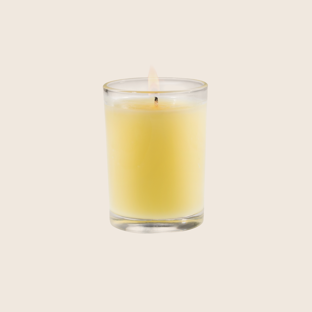 The Sorbet Votive Candle is fragranced with elements of lemon and lime entwined with peach, melon, and rose. Our candles are all hand-poured in Arkansas. Made with a proprietary wax blend, ethically sourced containers and cotton wicks. Light one of these aromatic candles and transport yourself to a memory or emotion. 