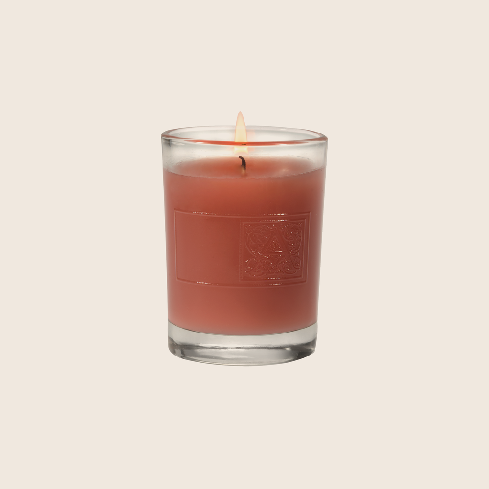 The Pomelo Pomegranate Votive Candle is the essential summertime candle, with a sweet citrus fragrance blend of oroblanco pomelo and pomegranate musk infused with a hint of clementine blossoms. Our candles are all hand-poured in Arkansas. Made with a proprietary wax blend, ethically sourced containers and cotton wicks. Light one of these aromatic candles and transport yourself to a memory or emotion.