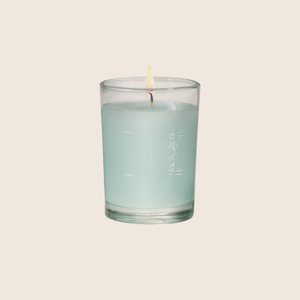 The Cotton Ginseng Votive Candle is fresh and light, with notes of cotton blended with jasmine, eucalyptus, and lavender florals enveloped with sandalwood and musk. Our candles are all hand-poured in Arkansas. Made with a proprietary wax blend, ethically sourced containers and cotton wicks. Light one of these aromatic candles and transport yourself to a memory or emotion. 